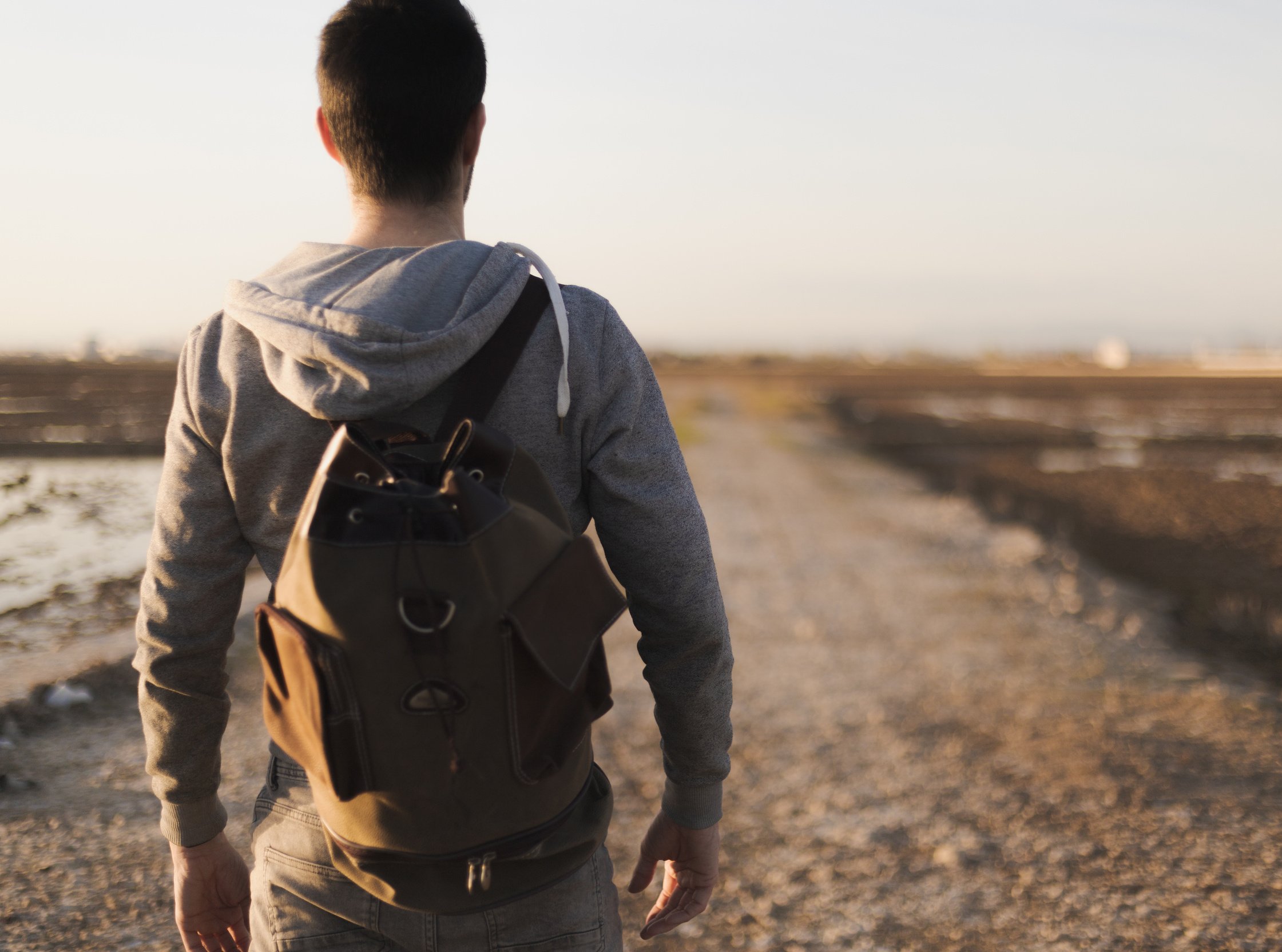 man with travel backpack